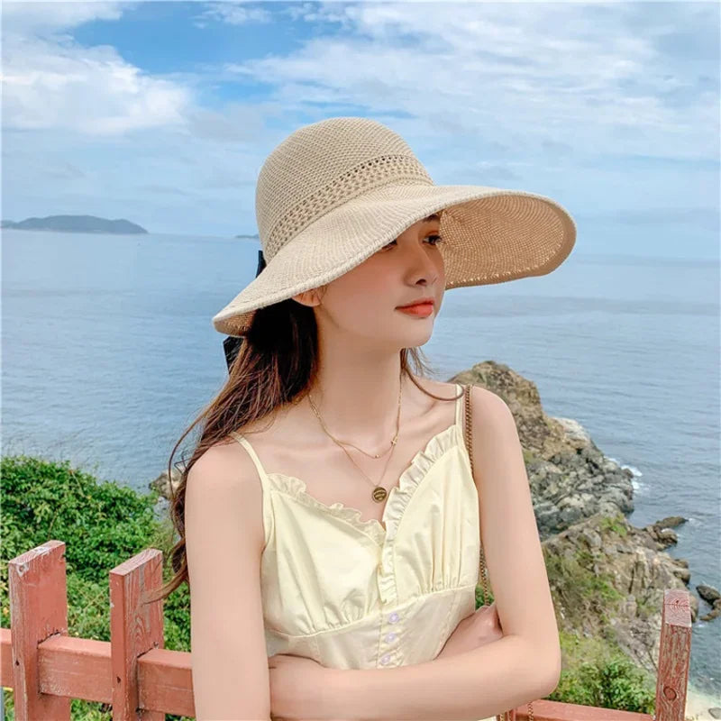 Madeleine hat Travel UV Beach Cap